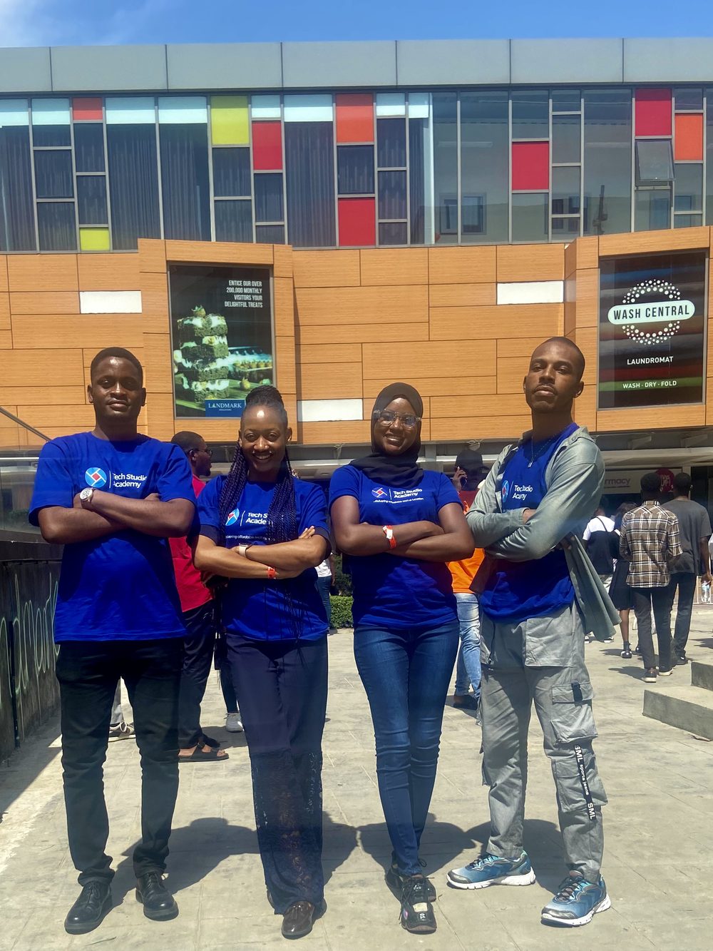 TSA students with the academy banner